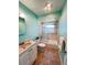 Bathroom with a sink and shower at 931 Juno Dr, Punta Gorda, FL 33950