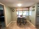 Bright breakfast nook with window, creating an intimate dining experience with space for two at 931 Juno Dr, Punta Gorda, FL 33950