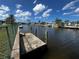 Private dock access along the canal, perfect for boating and enjoying waterfront living at 931 Juno Dr, Punta Gorda, FL 33950