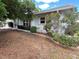 Well-maintained single-story home with tidy landscaping and curb appeal at 931 Juno Dr, Punta Gorda, FL 33950