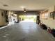 Spacious garage offering ample storage and an open view to the home's exterior at 931 Juno Dr, Punta Gorda, FL 33950