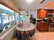 Cozy kitchen nook with bright windows and table at 931 Juno Dr, Punta Gorda, FL 33950