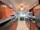 Functional kitchen features stainless steel appliances, plenty of cabinet space, and a convenient layout at 931 Juno Dr, Punta Gorda, FL 33950