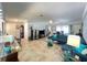 Open living room featuring tile floors, recessed lighting, and stylish furnishings at 931 Juno Dr, Punta Gorda, FL 33950