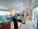 Bright living space showing tile floors, and windows and door to the lanai at 931 Juno Dr, Punta Gorda, FL 33950