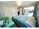 Bright main bedroom featuring tile floors at 931 Juno Dr, Punta Gorda, FL 33950