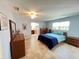 Large main bedroom with tiled floor and ensuite bathroom at 931 Juno Dr, Punta Gorda, FL 33950