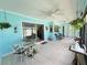 Spacious sunroom with ample seating areas for relaxation and entertaining at 931 Juno Dr, Punta Gorda, FL 33950