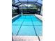 Inviting screened-in pool with clear blue water, perfect for relaxation and outdoor enjoyment at 931 Juno Dr, Punta Gorda, FL 33950