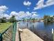 Beautiful waterfront community with a calm canal, featuring lush tropical foliage and waterfront properties with boat docks at 931 Juno Dr, Punta Gorda, FL 33950