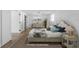 Serene bedroom with light walls, wood floors, complemented by a comfortable bed and ample closet space at 1020 Drury Ln, Englewood, FL 34224