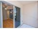 A private tiled balcony offers a tranquil view and seamless indoor-outdoor living through sliding glass doors at 1051 Forrest Nelson Blvd # 104, Port Charlotte, FL 33952
