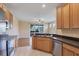 Functional kitchen featuring wood cabinets, and stainless steel appliances at 1085 Jonah Dr, North Port, FL 34289