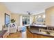 The kitchen has granite counters and opens to the living room with a sliding glass door to the lanai at 1085 Jonah Dr, North Port, FL 34289