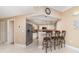 Charming kitchen featuring stylish bar seating, stainless steel appliances, and recessed lighting at 1326 Wesley Dr # 123, Punta Gorda, FL 33950