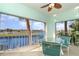 Screened lanai boasting serene water views and comfortable outdoor seating at 1326 Wesley Dr # 123, Punta Gorda, FL 33950
