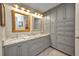 Updated bathroom has double sinks, granite counters and lots of cabinet storage at 1357 Le Pera Rd, Englewood, FL 34223
