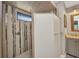 Modern bathroom featuring glass enclosed shower, unique tile work and granite vanity at 1357 Le Pera Rd, Englewood, FL 34223