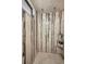 This gorgeous remodeled bathroom boasts a glass enclosed standing shower at 1357 Le Pera Rd, Englewood, FL 34223