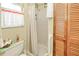 Well-maintained bathroom features a shower and built in shelves at 167 N Cambridge Nw Dr, Port Charlotte, FL 33952