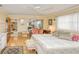 Comfortable bedroom with parquet floors, natural lighting, and ample space for rest and relaxation at 167 N Cambridge Nw Dr, Port Charlotte, FL 33952