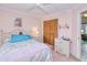 Serene bedroom with a cozy bed, matching dressers, and a closet for storage at 167 N Cambridge Nw Dr, Port Charlotte, FL 33952
