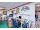 Functional home office setup with desk, comfortable chair, and ample storage space at 167 N Cambridge Nw Dr, Port Charlotte, FL 33952
