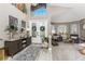 Inviting foyer with double doors, wood-look floors, and tasteful decor that creates an elegant entry at 1814 Pinyon Pine Dr, Sarasota, FL 34240
