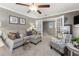 Comfortable living space featuring a couch, ceiling fan, and a small table at 1814 Pinyon Pine Dr, Sarasota, FL 34240