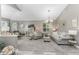 Bright living room featuring neutral color palette, vaulted ceilings and elegant furnishings for a cozy atmosphere at 1814 Pinyon Pine Dr, Sarasota, FL 34240