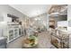 An open-plan living room featuring neutral walls, stylish decor and comfortable seating arrangements at 1814 Pinyon Pine Dr, Sarasota, FL 34240