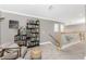 Reading nook with stairs and bookshelves at 1814 Pinyon Pine Dr, Sarasota, FL 34240