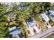 Aerial view shows the location of a beautiful home and surrounding lot within a neighborhood at 1851 Scenic Dr, Venice, FL 34293