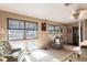 Comfortable living room featuring natural light and neutral décor with an open floorplan at 1851 Scenic Dr, Venice, FL 34293