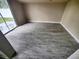 Bedroom featuring new floors and a glass sliding door with a view of the exterior at 190 Danforth Dr, Punta Gorda, FL 33980