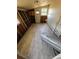 Laundry room displaying gray floors and a water heater in need of repair at 190 Danforth Dr, Punta Gorda, FL 33980