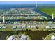 Expansive aerial shot showcasing the waterfront community and surrounding waterways at 21169 Edgewater Dr, Port Charlotte, FL 33952