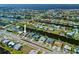 Aerial view showcasing the property's location on a canal with convenient access to waterfront amenities at 21169 Edgewater Dr, Port Charlotte, FL 33952