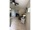 Relaxing enclosed patio with comfortable seating and plenty of natural light at 22191 Augusta Ave, Port Charlotte, FL 33952