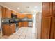Functional kitchen with stainless steel appliances, tiled backsplash and spacious countertops at 2230 Harbor Blvd, Port Charlotte, FL 33952