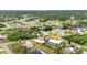 A beautiful home featuring a screened-in pool overlooking a canal in a serene, lush neighborhood setting at 2236 Arnet St, Port Charlotte, FL 33948
