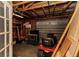 Functional garage with storage shelves, tool bench, and a garage door at 2236 Arnet St, Port Charlotte, FL 33948
