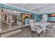 Open living area with dining space, transitioning into other rooms, showcasing modern design elements at 2236 Arnet St, Port Charlotte, FL 33948