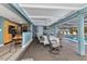 Inviting dining area featuring pool views, with a kitchen nook, and ceiling fan at 2236 Arnet St, Port Charlotte, FL 33948