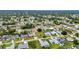 A residential neighborhood with single-Gathering homes, green lawns, and neatly arranged streets at 23104 Turnbull Ave, Port Charlotte, FL 33954