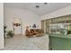 Open living space with view of the patio and outdoor pool at 23104 Turnbull Ave, Port Charlotte, FL 33954
