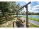 Relax on this community swing bench near the tennis courts at 23465 Harborview Rd # 925, Punta Gorda, FL 33980