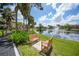 Relax and unwind on the community benches with a view of the pond at 23465 Harborview Rd # 925, Punta Gorda, FL 33980