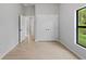 This is a bedroom featuring a neutral color scheme, a closet and tile flooring at 2354 Bonanza Ln, North Port, FL 34286