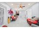 Bright living room featuring tile floors, modern decor, and comfortable seating at 25068 Harborview Rd # 1B, Punta Gorda, FL 33980